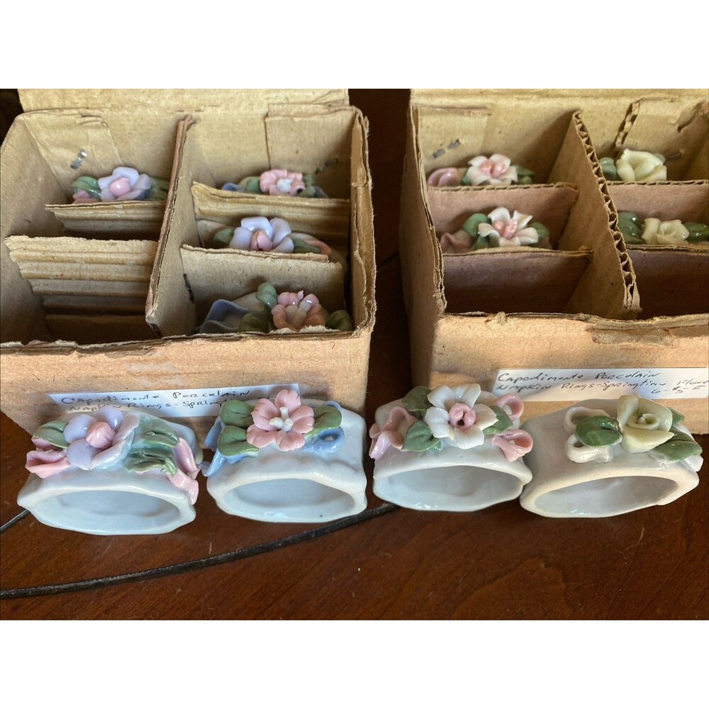 12 Vintage Ceramic Flower Napkin Rings Beautiful!!!. In boxes.